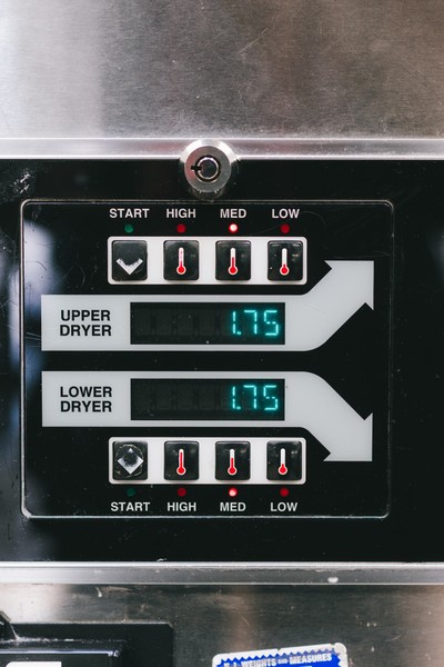 Dexter stack dryer control panel displaying cycle time and temperature settings
