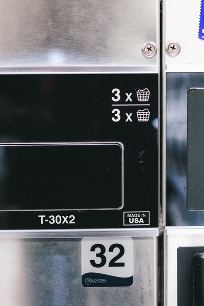 Dexter T-30X2 stack dryer capacity label and machine number close-up